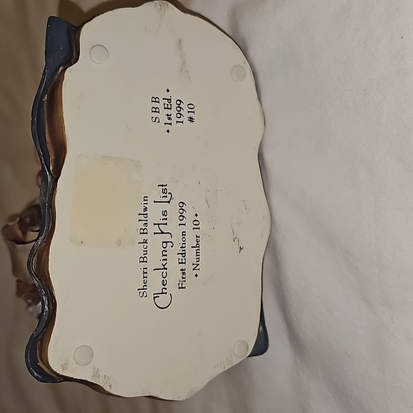 Checking his list - Picture 2 of 3